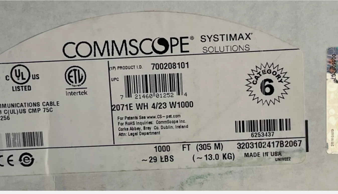 A close-up of the specification label for the CommScope 2071E Cat6 plenum white cable