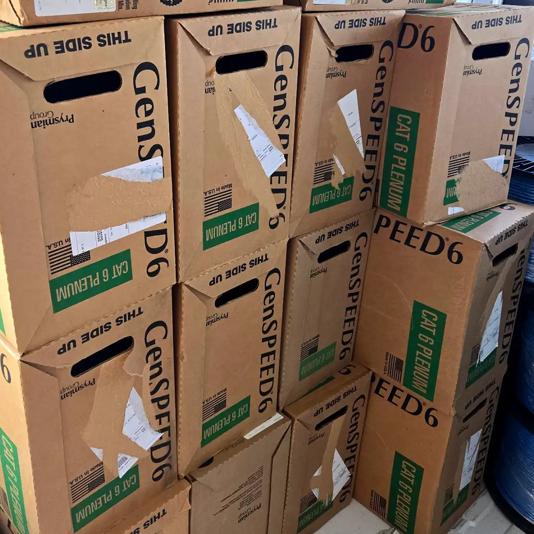 A bulk stack of GenSPEED 6 Cat6 Plenum cable pull boxes