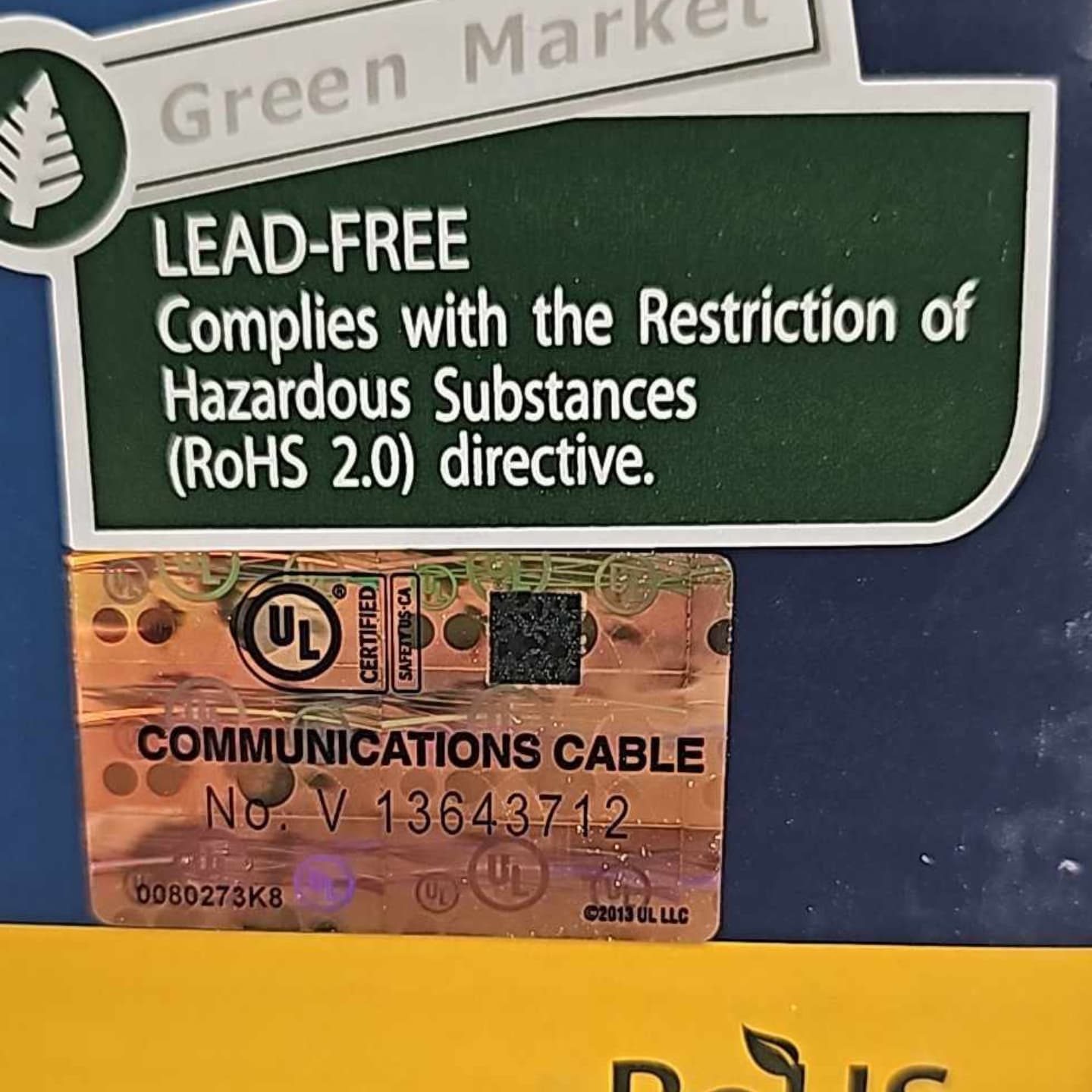A close-up of the UL Certified and RoHS Lead-Free compliance stickers on the product box