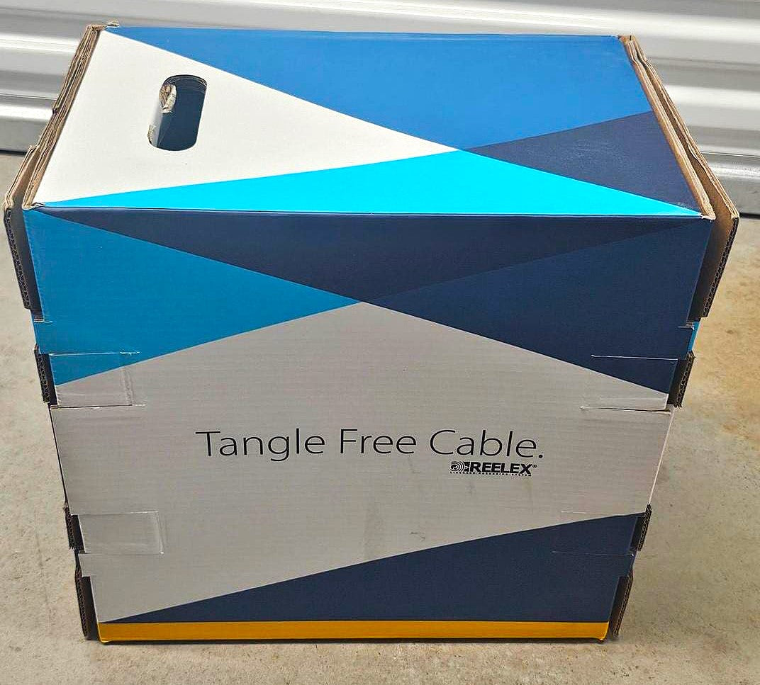 The top and side of the ICE cable pull box featuring the 'Tangle Free Cable' REELEX branding
