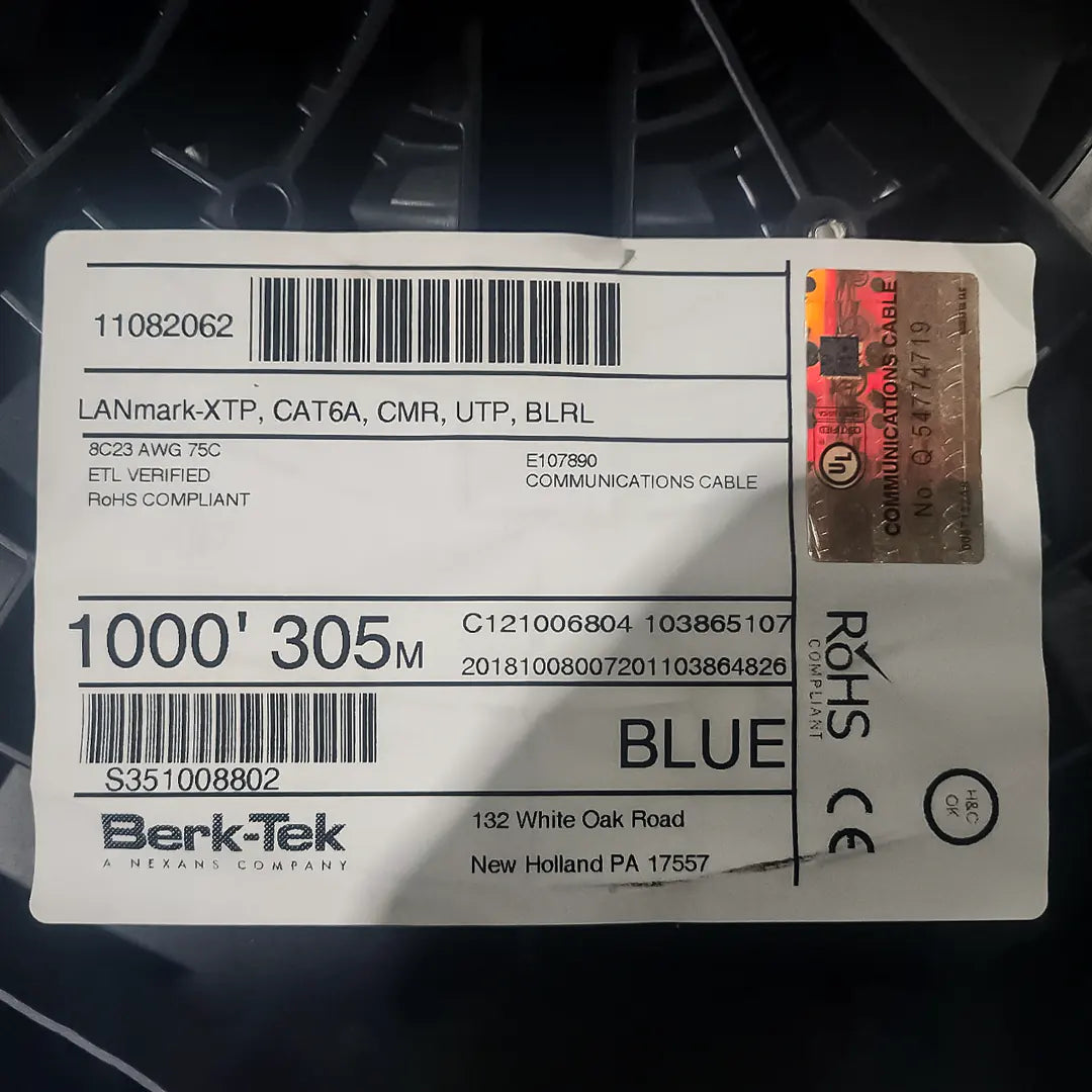 Label on a roll of Berk-Tek cable with product details and branding.