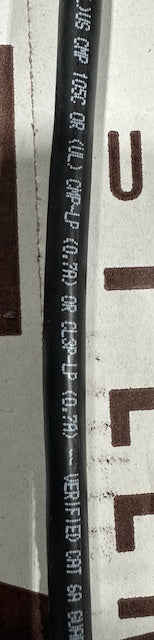 A close-up of the 'Verified Cat 6A' performance text printed on the Belden cable jacket