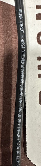 The 'BELDEN 10GX53F SHIELDED' part number printed on the cable jacket